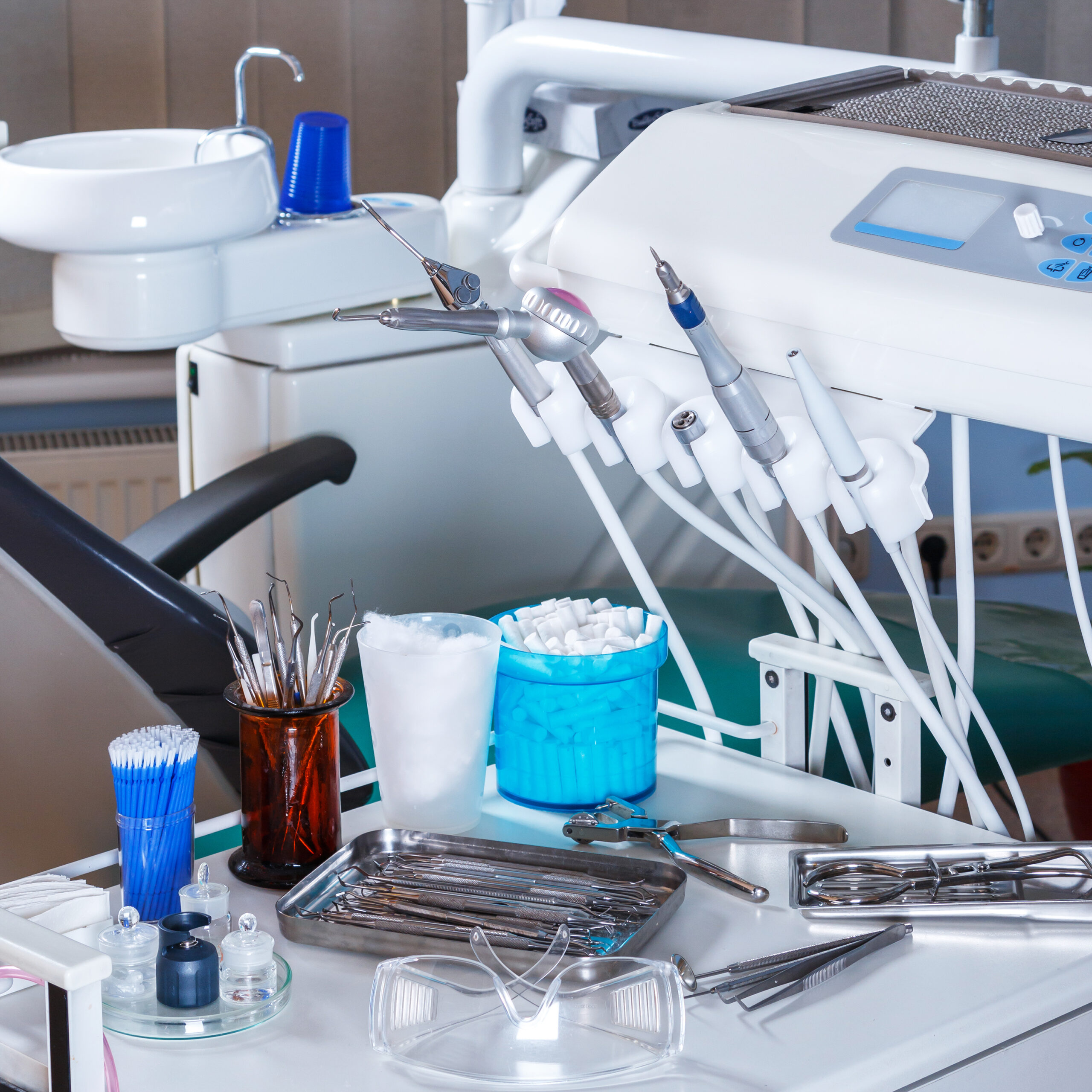 Dental operatory chair with handpieces, cotton products and instruments